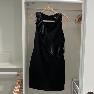 Women’s black mini dress.